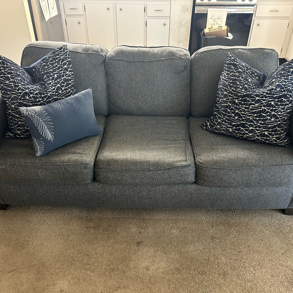 Elegant Gray Sofa with Blue Accent couch and pillows